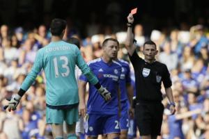 Chelsea defender John Terry is shown a red card in the defending champions' opening game against Swansea.